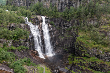 Fototapeta na wymiar aerial view of waterfall in the mountains