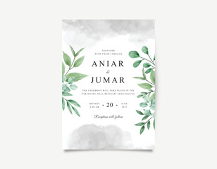 Wedding invitation card with beautiful green leaves