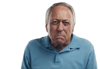 PNG Shot of an old man looking angrily at the camera in a studio.