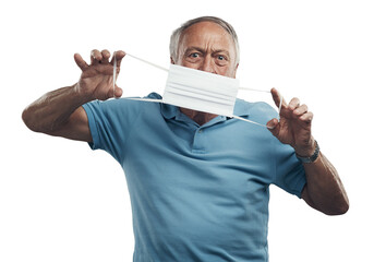 PNG Shot of an elderly man holding a protective face mask in a studio.