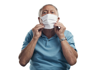 PNG Shot of an older man wearing a protective face mask in a studio.