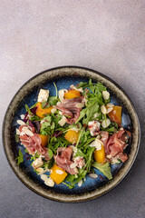 delicious salad on a gray background
