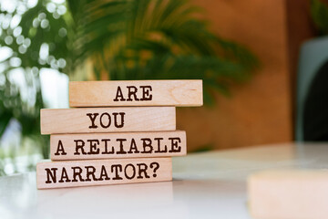 Wooden blocks with words 'Are You a Reliable Narrator?'.