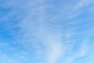 soft blue sky with light veil clouds