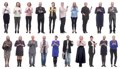 Fototapeta premium group of people holding phone in hand and looking at camera