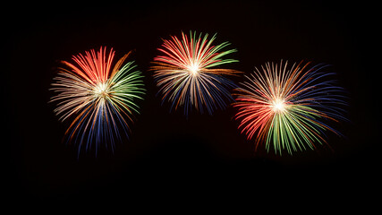 Isolated on black sky background. Isolated firework ready to use for decoration in any photograph ,poster, backdrop to celebrate the festival, Christmas,  New year and any events.