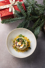 Merry Christmas. delicious salads on a gray background
