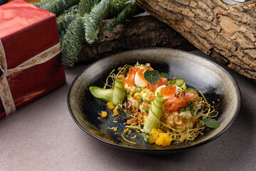 Merry Christmas. delicious salads on a gray background
