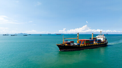 cargo logistics container ship sailing in green sea to import export goods and distributing products to dealer and consumers across worldwide, by container ship Transport business service