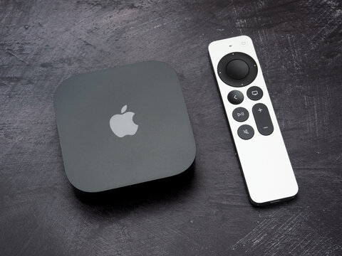 Bucharest, Romania - December 4, 2022: Product shot of the Apple TV 4k 2022 with WiFi and Ethernet, 128Gb RAM, and with Siri Remote