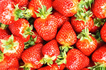 Ripe red strawberries. Strawberry background. Fresh organic red ripe Strawberry fruit background