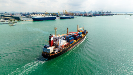 cargo logistics container ship sailing in green sea to import export goods and distributing products to dealer and consumers across worldwide, by container ship Transport business service