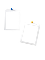 Instant frames hang on wall with colored pins. Isolated