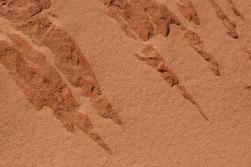 traces of sand and rock