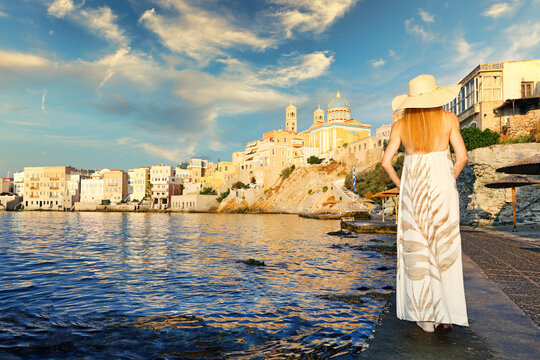 Young woman at the beach Agios Nikolaos - Asteria - Vaporia of Hermoupolis in Syros, Greece