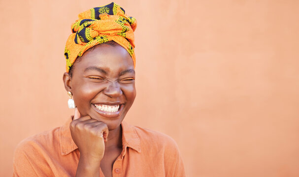 Black Woman, Face And Smile With A Turban And Free Space For African Culture, Happiness And Beauty Mockup On Peach Background. African Female With Nigeria Tradition Fashion Head Scarf While Laughing