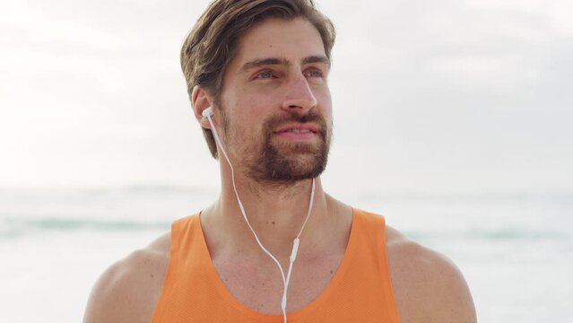 Man at beach, fitness and breathe for peace, zen and outdoor exercise with earphones for music or podcast, relax with sea view mockup. Wellness, freedom and calm with healing, breathing and nature.