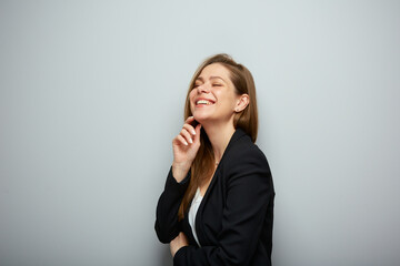 Happy thinking business woman with closed eyes, profile portrait with copy space.