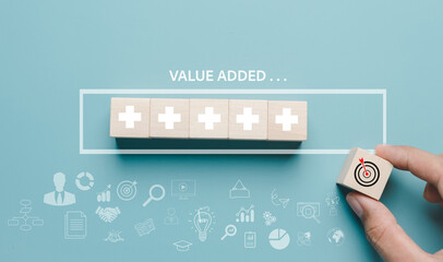 Business hand picking target value added download progress and profit to benefit growth and...