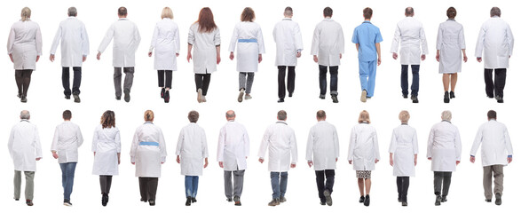 group of doctors in motion isolated on white