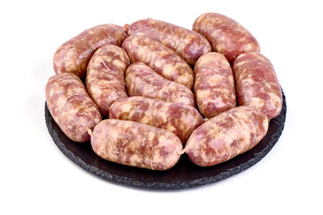 German Oktoberfest Sausages with basil leaf, close-up, isolated on white background.