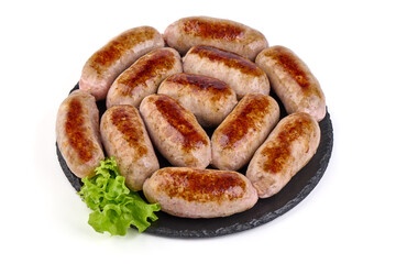 Grilled pork bangers, isolated on white background.