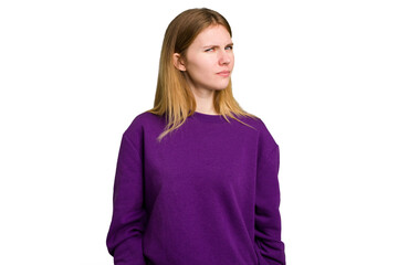 Fototapeta premium Young caucasian woman isolated frowning face in displeasure, keeps arms folded.