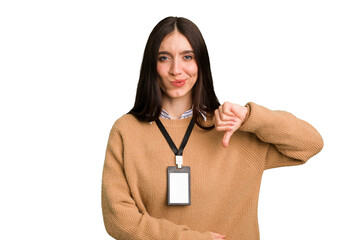 Young caucasian woman with ID card isolated showing a dislike gesture, thumbs down. Disagreement...