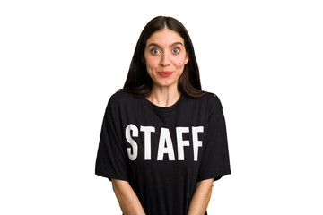 Young caucasian staff woman isolated shrugs shoulders and open eyes confused.