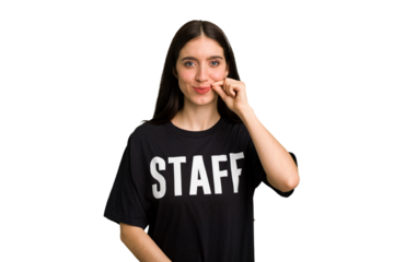 Young caucasian staff woman isolated with fingers on lips keeping a secret.