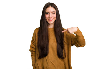 Young caucasian brunette long hair woman cutout isolated person pointing by hand to a shirt copy space, proud and confident