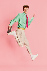 Creative portrait of stylish emotional man, student geek wearing vintage style shirt and trousers...