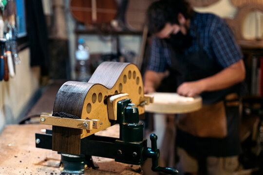 Luthier Working In His Workshop