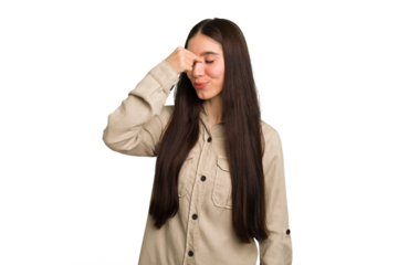 Young caucasian brunette long hair woman cutout isolated having a head ache, touching front of the face.