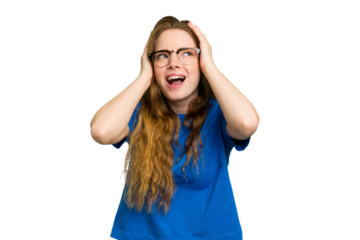 Young caucasian redhead woman isolated covering ears with hands trying not to hear too loud sound.