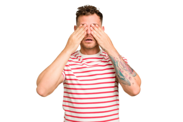 Young caucasian handsome man isolated afraid covering eyes with hands.