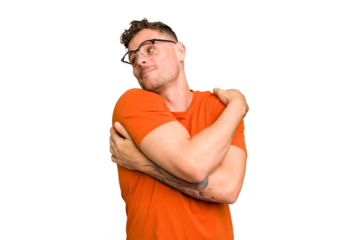 Young caucasian handsome man isolated hugs, smiling carefree and happy.