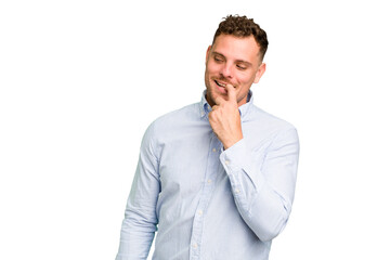 Young caucasian handsome man isolated relaxed thinking about something looking at a copy space.