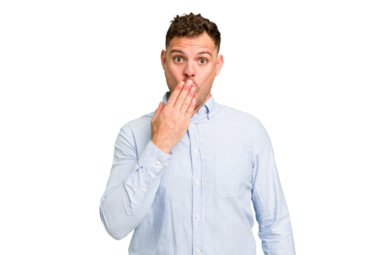 Young caucasian handsome man isolated shocked, covering mouth with hands, anxious to discover something new.