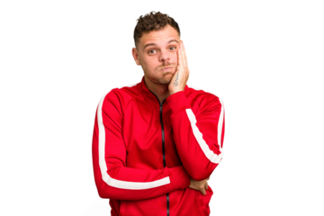 Young caucasian handsome man isolated blows cheeks, has tired expression. Facial expression concept.