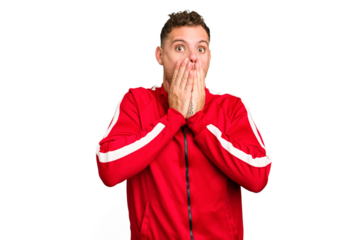 Young caucasian handsome man isolated shocked, covering mouth with hands, anxious to discover something new.