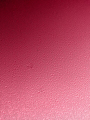 Fototapeta premium Trendy color 2023 viva magenta red toned abstract water drops on glasses window gradient background