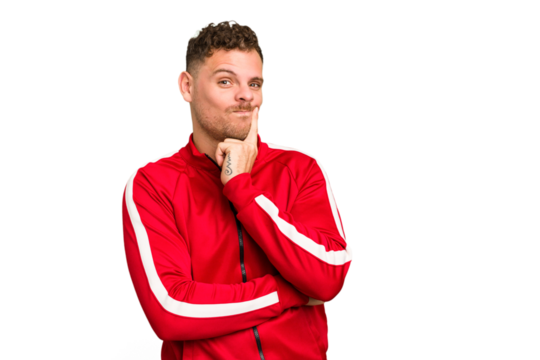 Young caucasian handsome man isolated contemplating, planning a strategy, thinking about the way of a business.