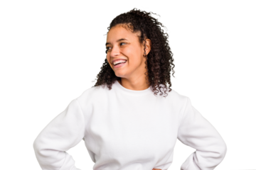 Young Brazilian curly hair cute woman isolated confident keeping hands on hips.