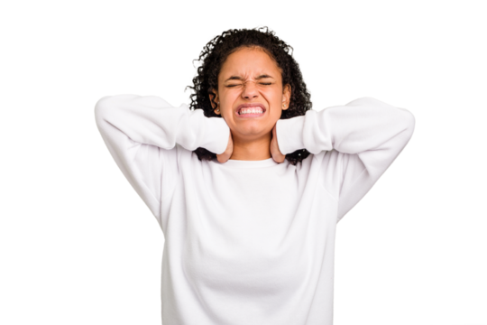 Young Brazilian curly hair cute woman isolated suffering neck pain due to sedentary lifestyle. - Powered by Adobe