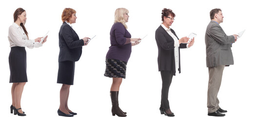 group of people holding tablet and looking ahead