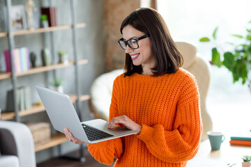 Portrait of adorable positive lady secretary recruiter use device choose read cv resume speak interviewee modern workplace indoors