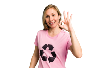 Young caucasian woman wearing a recycling t-shirt isolated cheerful and confident showing ok gesture.
