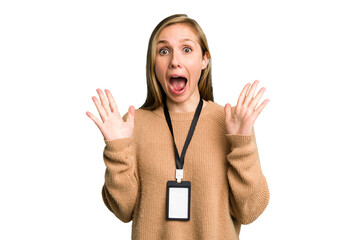 Young caucasian woman with ID card isolated surprised and shocked.