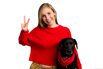 Young caucasian woman and her dog isolated showing number two with fingers.